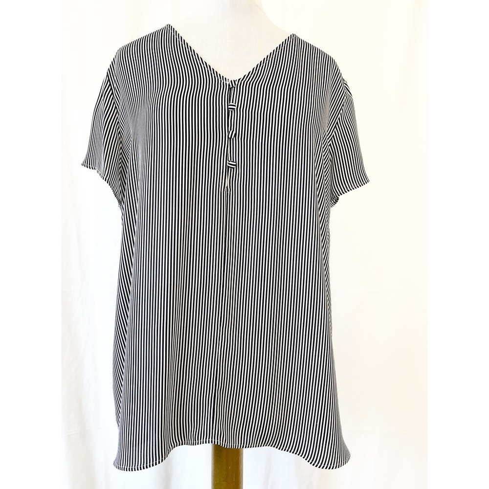 Ann Taylor loft blue and white striped top with covered buttons.